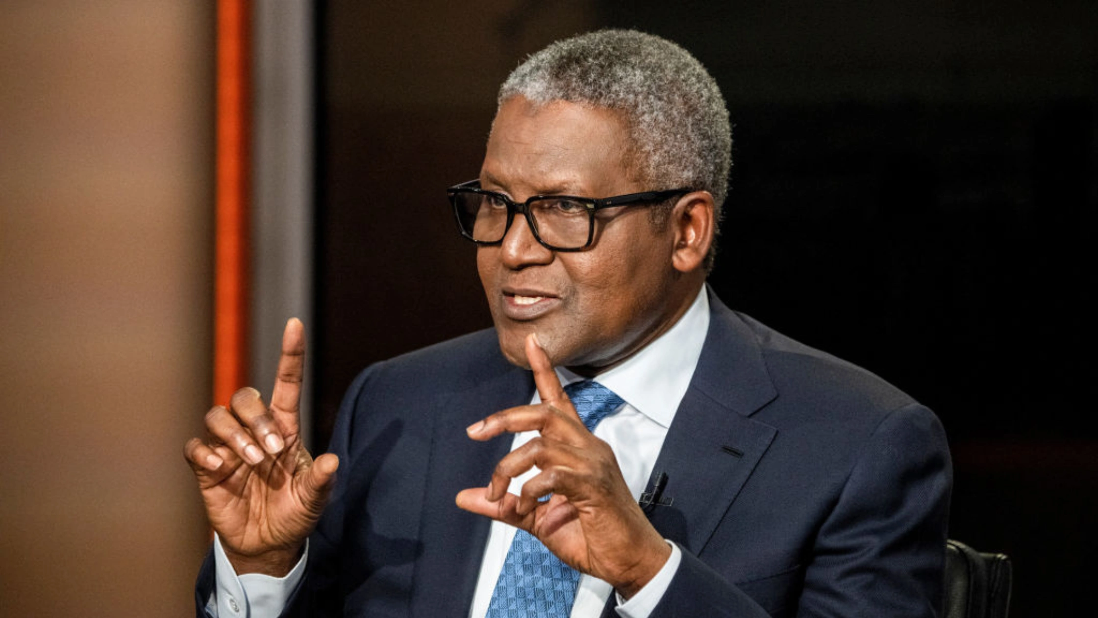 Aliko Dangote speaking at press briefing announcing that petrol to sell for N740 per litre from the Dangote Refinery, signaling a major market shift in Nigeria.