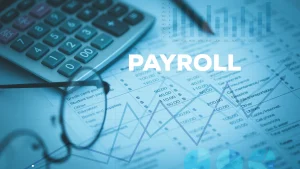 Payroll and tax management concept with calculator, financial documents, and growth charts