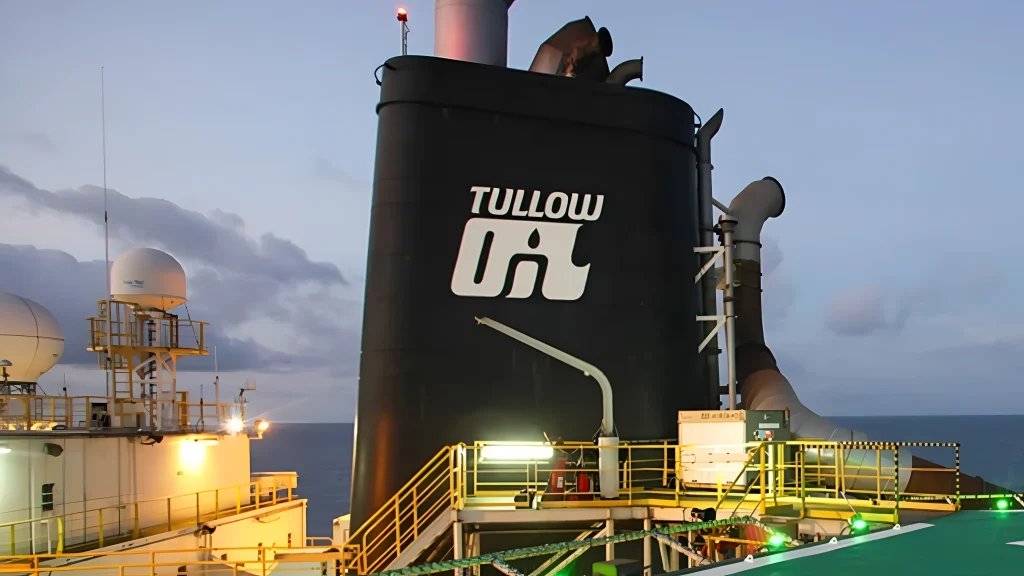 Tullow Oil FPSO vessel funnel at dusk offshore Ghana, representing Ghana oil and gas tax compliance in the petroleum sector