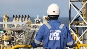 Tullow Oil worker on an offshore platform, symbolizing Ghana oil and gas tax compliance for multinational petroleum operators