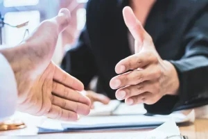 Professional employer organization services facilitating business discussions and employment agreements